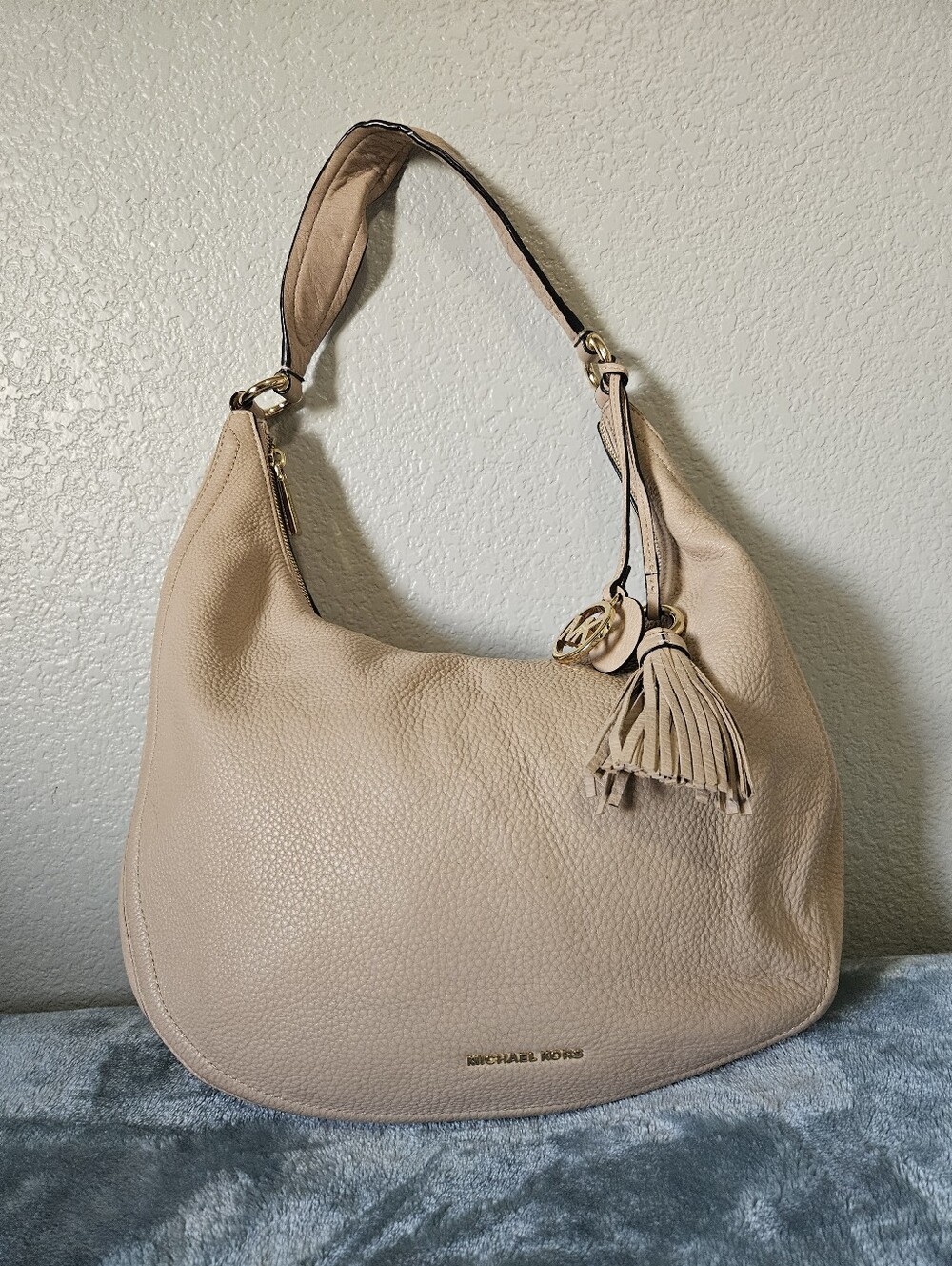 Michael Kors Beige Pebbled Leather Hobo with Tassel Charm
